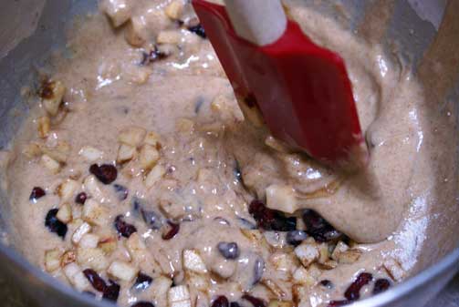 folding-in-cranberries-and- folding in cranberries and Cranberry Apple Muffins