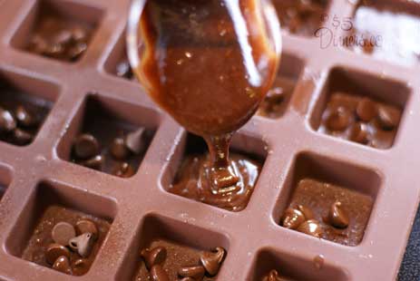 brownie-batter-into-cups-2 brownie batter into cups 2 Raspberry Chocolate Chip Brownies