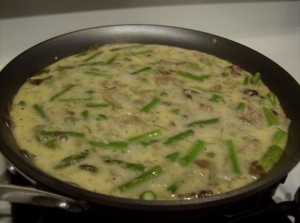 frittata cooking 640x477 300x223 Aleas Steak and Asparagus Frittata   Breakfast for Dinner!