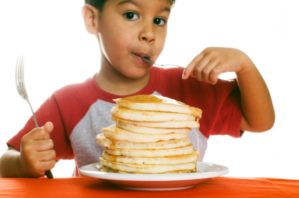 5 Ways to Use Brown Bananas Guest Post boy with pancakes 5 Ways to Use Brown Bananas Guest Post