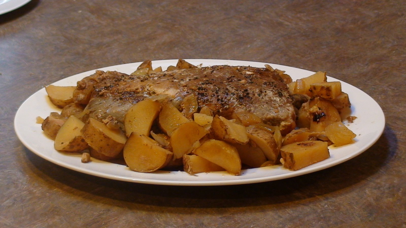 Slow Cooker Pork Roast with Tomatoes, Onions and Potatoes