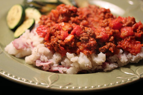 goulash on mashed potatoes