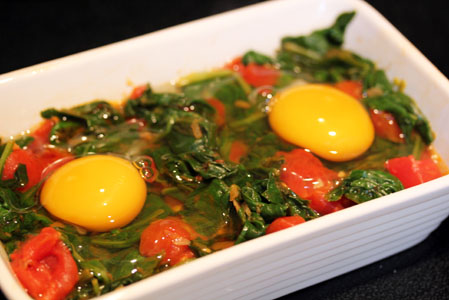 Baked Eggs with Spinach, Tomatoes, and Garlic | 5DollarDinners.com