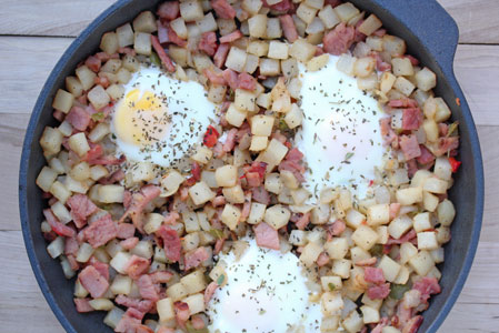 ham and potatoes with baked eggs