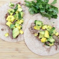 Instant Pot Shredded Beef Tacos with Mango Avocado Salsa from 5DollarDinners.com