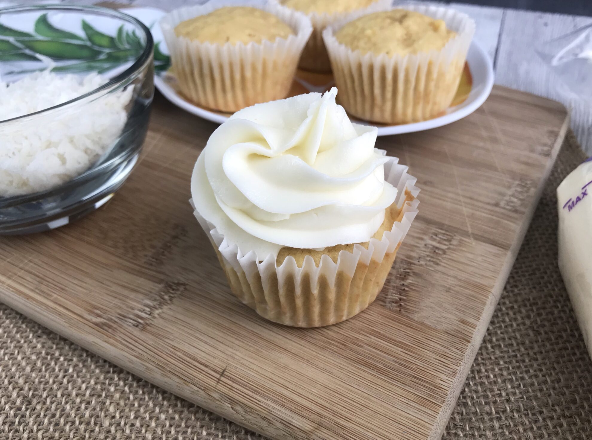 These Pineapple Cupcakes will whisk you away to the Tropics! The perfect refreshing dessert as a snack or for a birthday on 5DollarDinners!