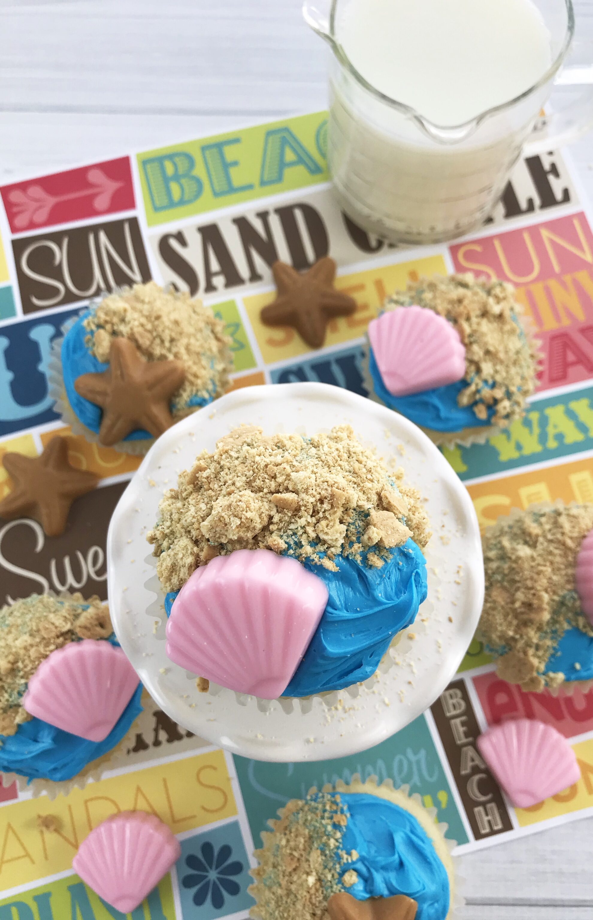 Summer is here and these Beachy Cupcakes are the perfect dessert to dish up for a BBQ or Party and the kids will love to help! Find these adorable treats on 5 Dollar Dinners!!