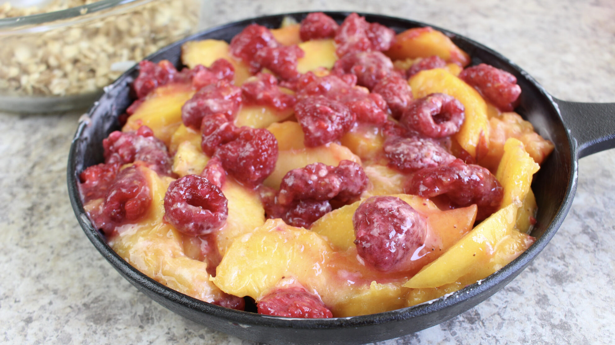 With fall around the corner this Skillet Peach Raspberry Crisp is calling my name and it's the perfect dessert!!! Find it on 5 Dollar Dinners!