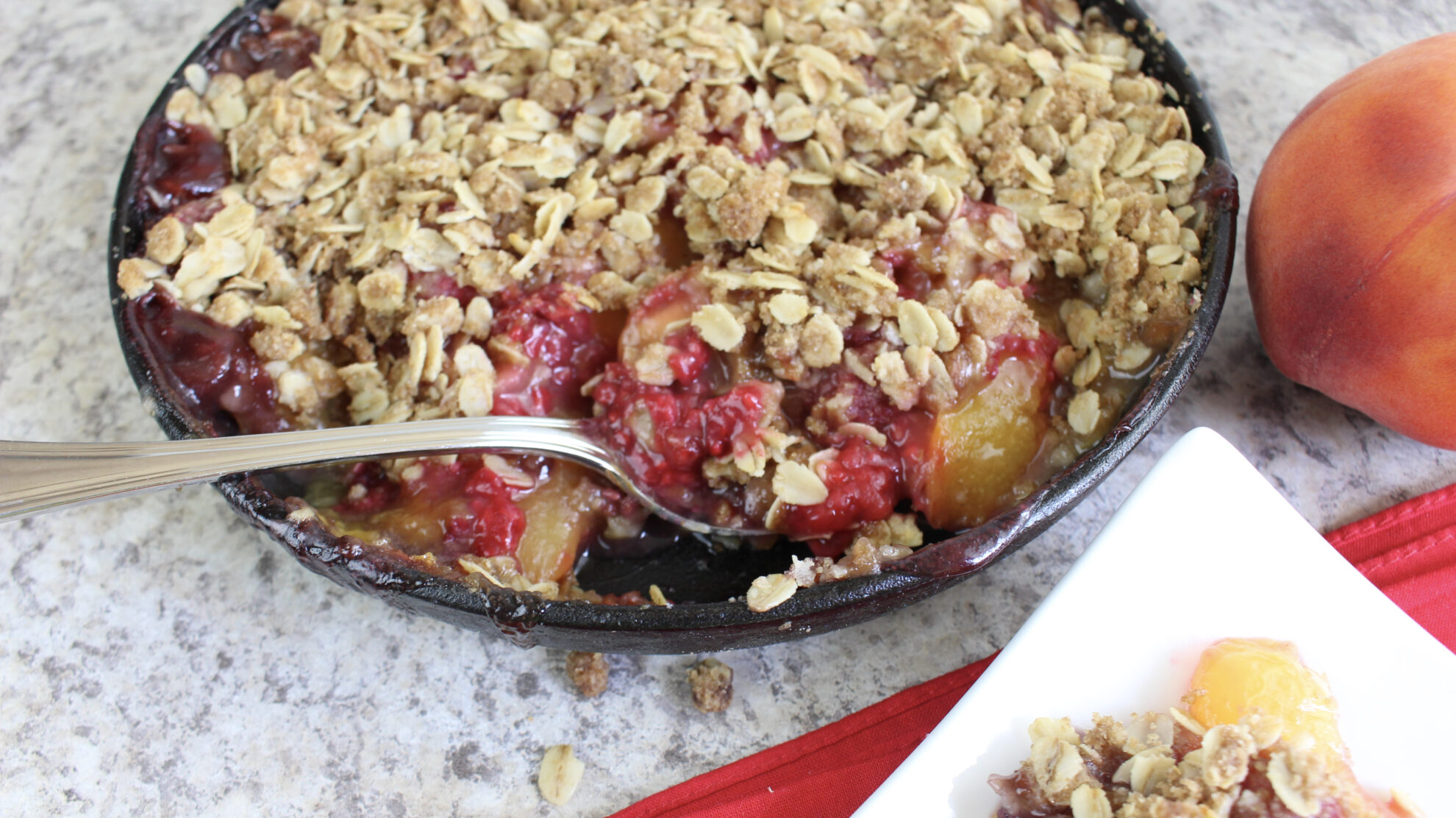 With fall around the corner this Skillet Peach Raspberry Crisp is calling my name and it's the perfect dessert!!! Find it on 5 Dollar Dinners!