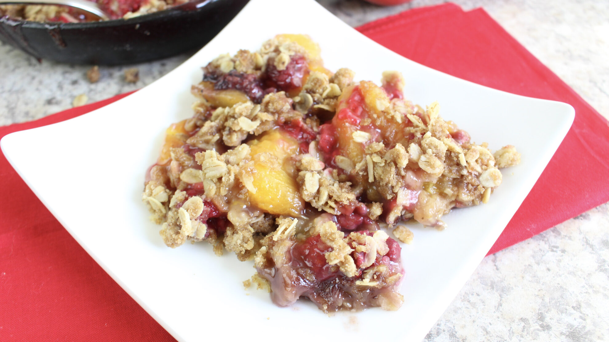 With fall around the corner this Skillet Peach Raspberry Crisp is calling my name and it's the perfect dessert!!! Find it on 5 Dollar Dinners!