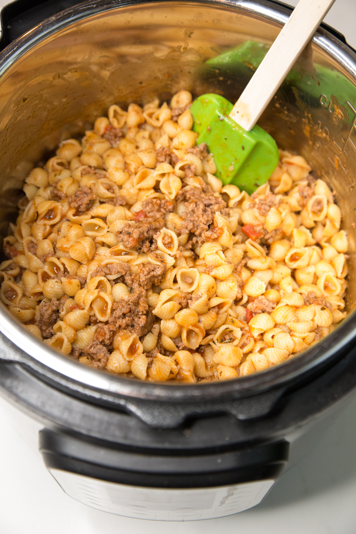 In just under 20 minutes with the help of the Instant Pot this tasty Cheesy Goulash is the perfect recipe for a busy weeknight meal! Find it all on 5 Dollar Dinners!!!