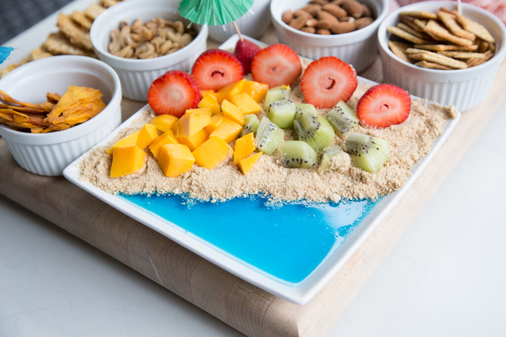 tropical beachy summer themed charcuterie board